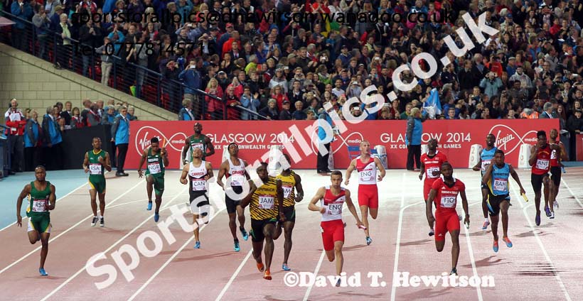 Usain Bold takes Jamaica into the lead and on to victory in the 4 x 100 metres at the Commonwealth Games, Glasgow. Photo: David T. Hewitson/Sports for All Pics